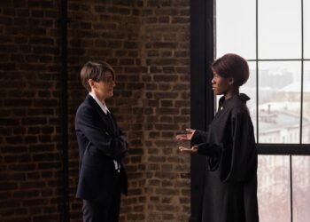 A courtroom scene with a judge and lawyers discussing a case on insider trading.