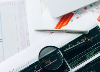 Centrifuge Token logo with upward trending graph and financial charts in the background.