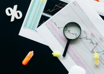 Calm office environment with charts and reports, highlighting financial regulation issues.