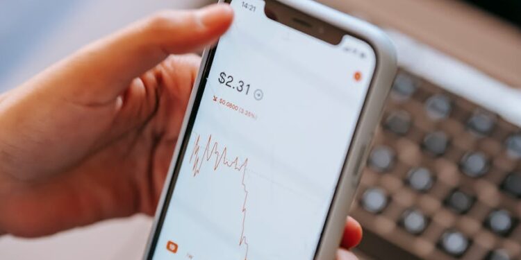 A trader analyzes crypto charts with Gracy AI interface on a laptop screen.