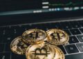 Cryptocurrency exchange platform displaying charts and currency symbols with a sanction notice.