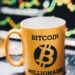 A trader analyzing cryptocurrency charts on a laptop, with Bitcoin and DeFi symbols visible.