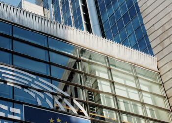 Business team celebrating the Malta Payment Institution license for EU market expansion.