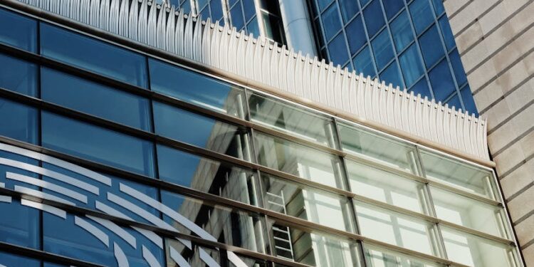 Business team celebrating the Malta Payment Institution license for EU market expansion.