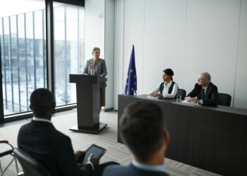 Nicholas Hammer, Blockfills CEO, speaking at a finance conference, looks concerned.