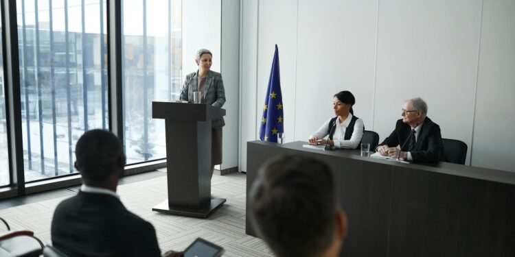 Nicholas Hammer, Blockfills CEO, speaking at a finance conference, looks concerned.