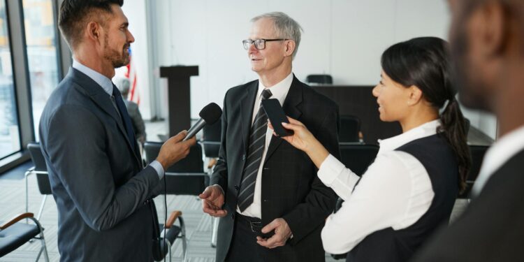 SBI and Startale executives discuss the launch of JPYSC stablecoin at a press conference.