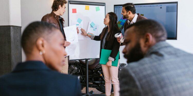 A diverse group of entrepreneurs presents at a crypto pitch competition in Hong Kong.