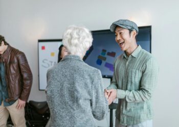 Venture capitalists discussing AI and robotics investment in a modern office setting.