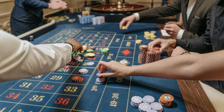 A person places a bet on a digital platform showing unlicensed gambling activity.