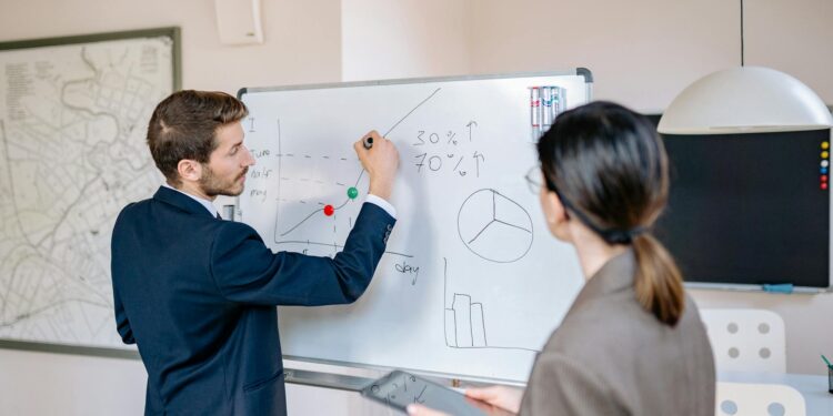 Tether executives discuss investment strategies at a conference, with charts and graphs displayed.