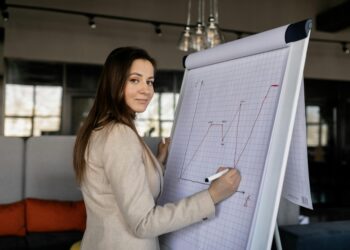 Coinbase CEO discusses UK stablecoin yield caps at a financial conference.