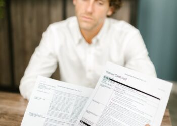 A business meeting with Block employees discussing job cuts and AI impact on finance.