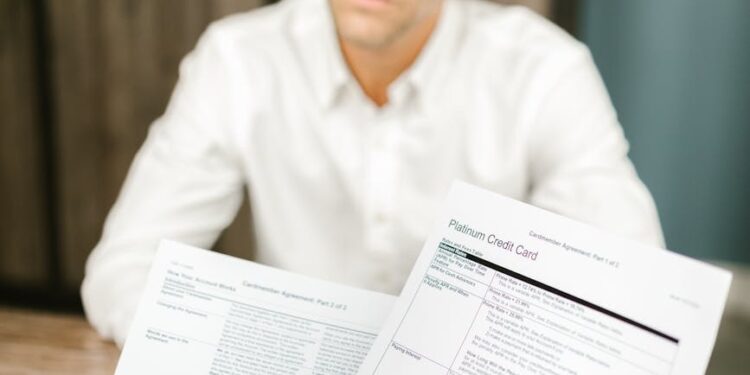 A business meeting with Block employees discussing job cuts and AI impact on finance.