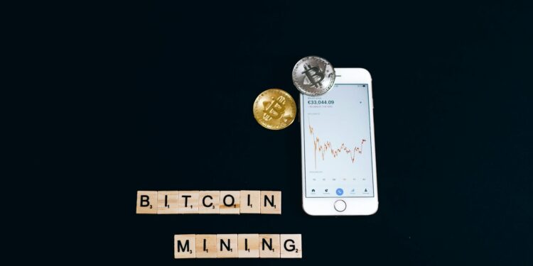 A digital representation of Bitcoin with fluctuating charts and global maps in the background.