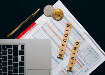 A digital representation of Bitcoin with charts indicating cryptocurrency growth and investment strategy.