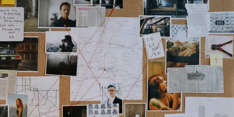 Police officers escorting suspects linked to a crypto ransom kidnapping case.