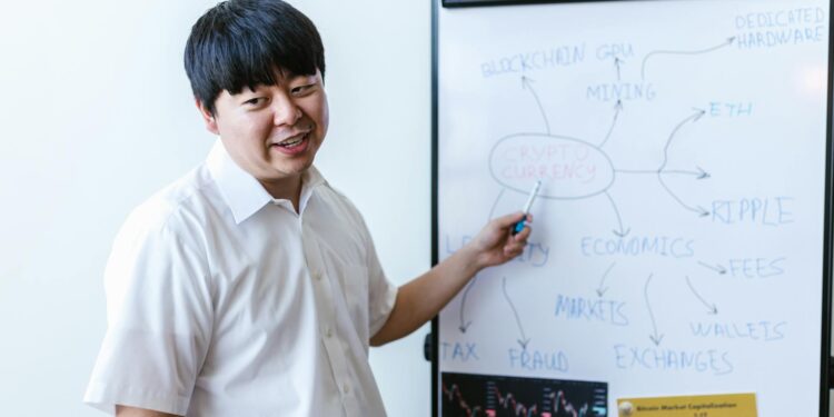 Two professionals discussing blockchain technology with digital finance graphics in the background.