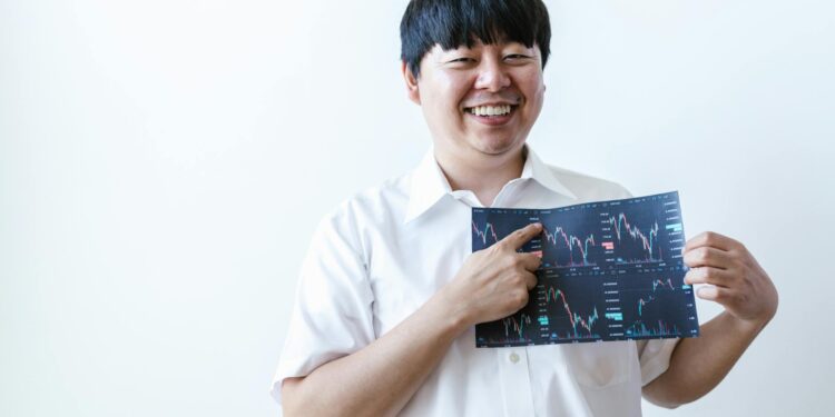 Concerned investors discuss cryptocurrency losses in a crowded conference room.