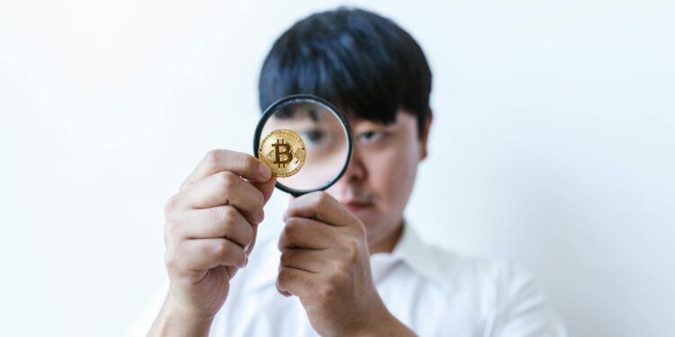 Two teenagers holding knives in an urban setting, linked to a crypto heist investigation.