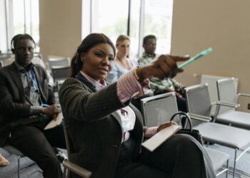 Conference attendees engage in discussions at the Web3 and AI Summit 2026 in Tokyo.