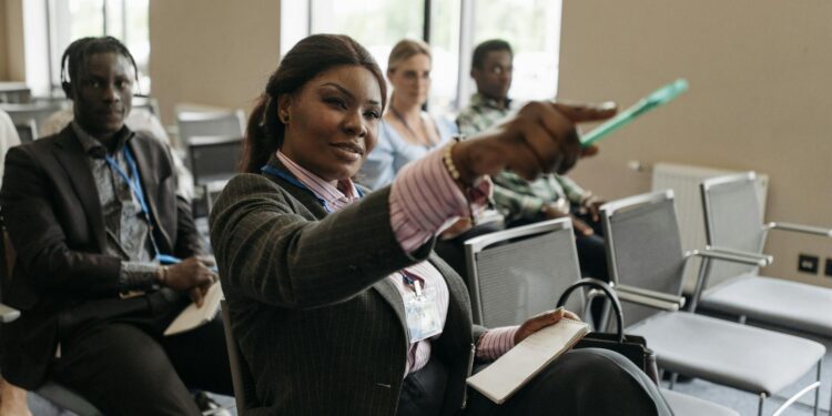 Conference attendees engage in discussions at the Web3 and AI Summit 2026 in Tokyo.