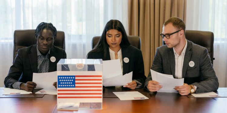 A group of diverse officials discussing cryptocurrency regulations at a conference table.