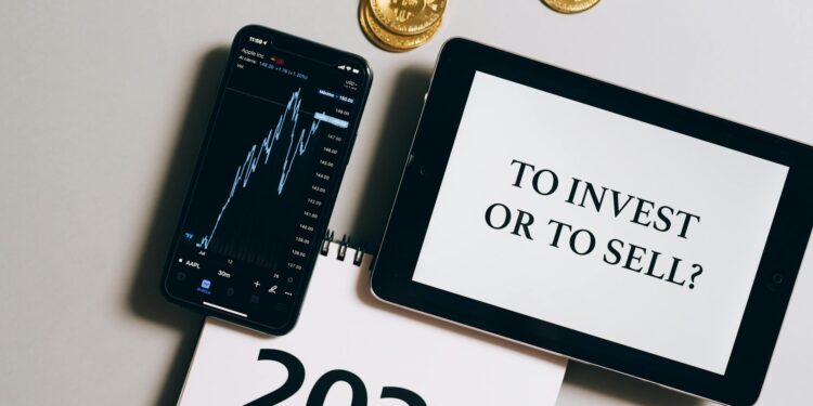 A person looks at a smartphone displaying cryptocurrency charts and news articles.