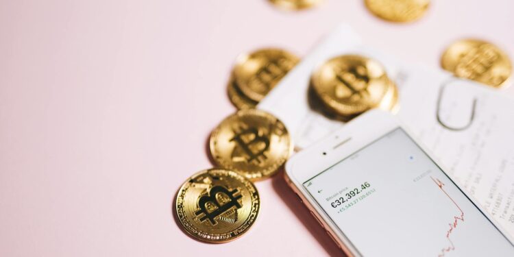 Digital currency coins with a backdrop of financial charts and Bhutan's flag.