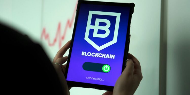 Close-up of a Bitcoin symbol displayed on a digital exchange interface screen.