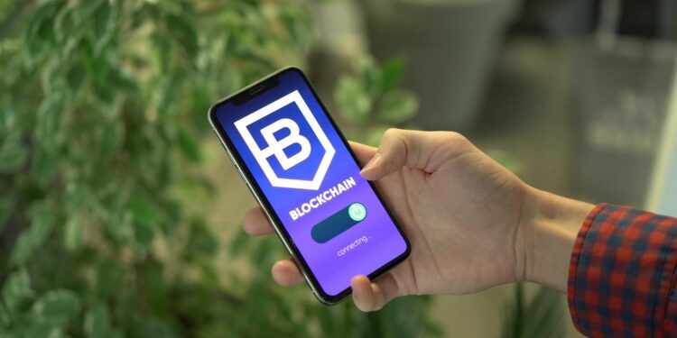 User engaging with a smartphone displaying cryptocurrency wallet and banking interface.