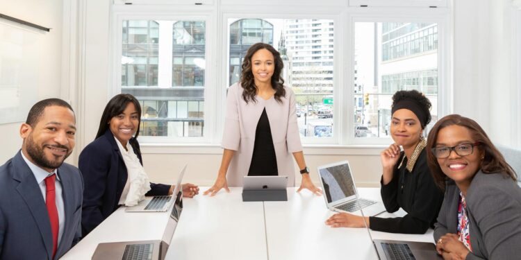 RedStone team members discussing cryptocurrency price feeds at a conference.