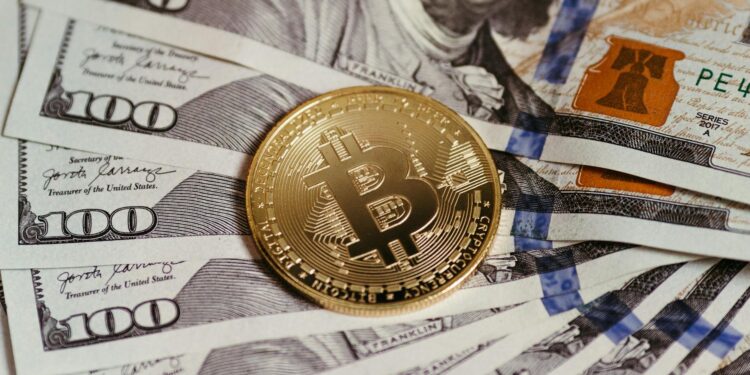 A person using a smartphone to make a cryptocurrency payment at a Brazilian market.