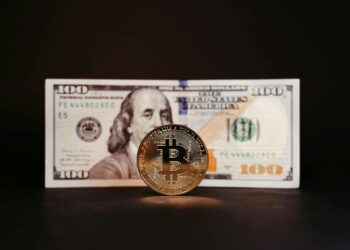 Six individuals and two firms linked to crypto laundering under US sanctions depicted.