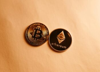 Investors analyzing Bitcoin and Ethereum ETF charts in a modern financial setting.