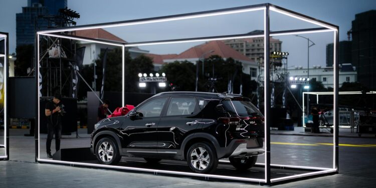 Ripple representatives at a launch event, showcasing their new crypto platform features.