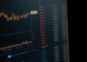 A Binance logo with financial charts and regulatory symbols in the background.