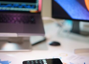 A graph showing rising revenue figures with cryptocurrency symbols in the background.