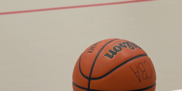 Tristan Thompson leaving a basketball court, fans reacting with mixed emotions.