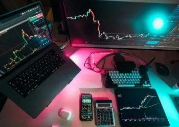 Android smartphone displaying a cryptocurrency wallet with warning symbols indicating security risks.