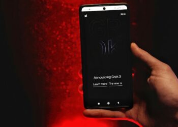 Elon Musk and Andrej Karpathy engage in discussion about AI job impact map.