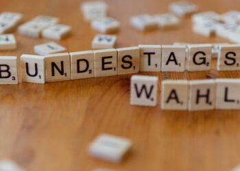 UK lawmakers discussing cryptocurrency regulation in a parliamentary setting.