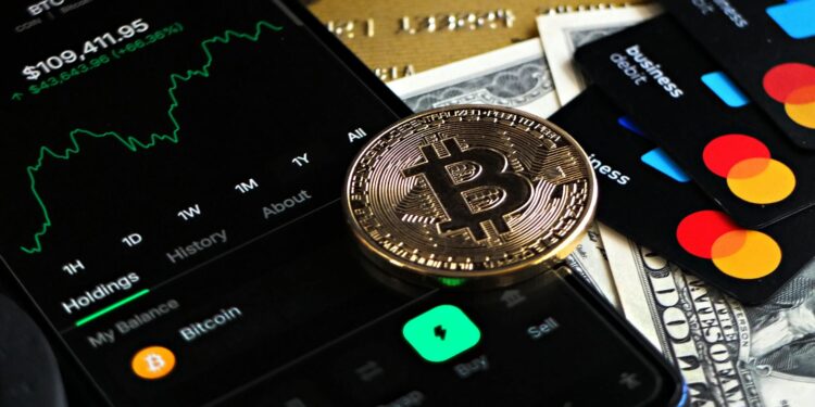 A credit card featuring cryptocurrency symbols and the Avalanche logo, symbolizing innovation in finance.