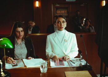 A courtroom setting with lawyers discussing financial regulations on gambling.