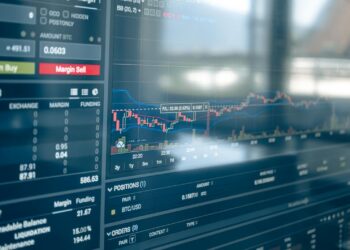 A trader analyzes cryptocurrency trends on a digital platform with AI trading tools.