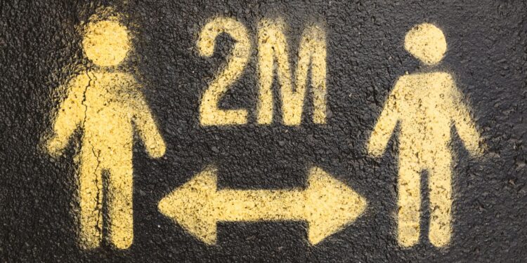 Two trading platforms logos with a warning sign, symbolizing insider trading prevention measures.