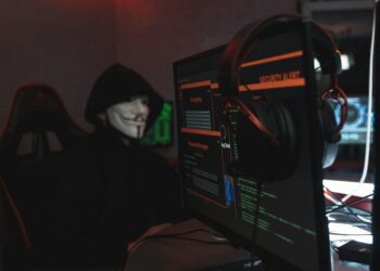 White hat hackers analyzing code for crypto security following Foom Cash exploit recovery.