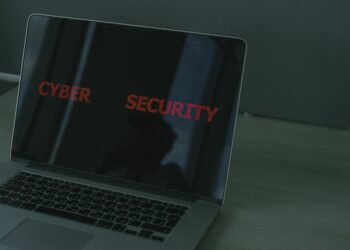 A close-up of a computer screen displaying malware alerts in a gaming chat.