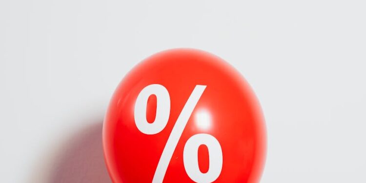 Graph showing Bitcoin price surge alongside Federal Reserve interest rate cut signals.