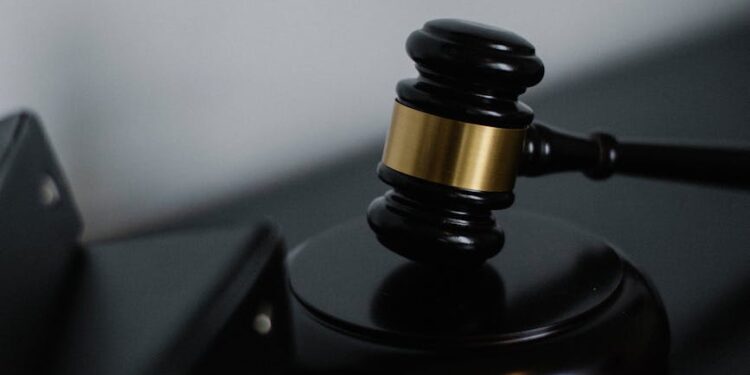 A gavel and legal documents representing a court ruling on financial regulations.